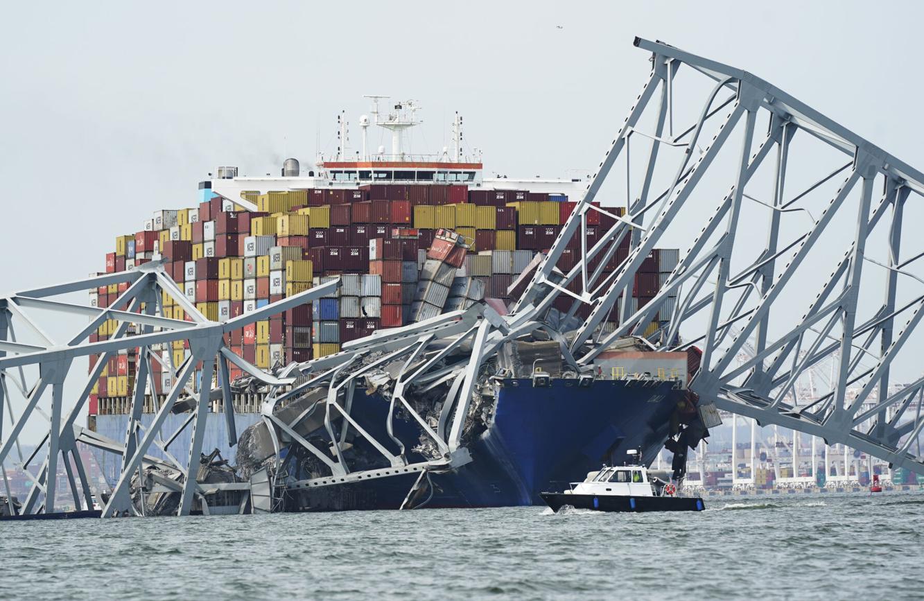 Baltimore bridge collapses after powerless cargo ship rams into support