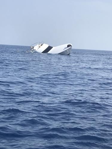 High-dollar sports fishing boat crashes into shrimping boat, sinks