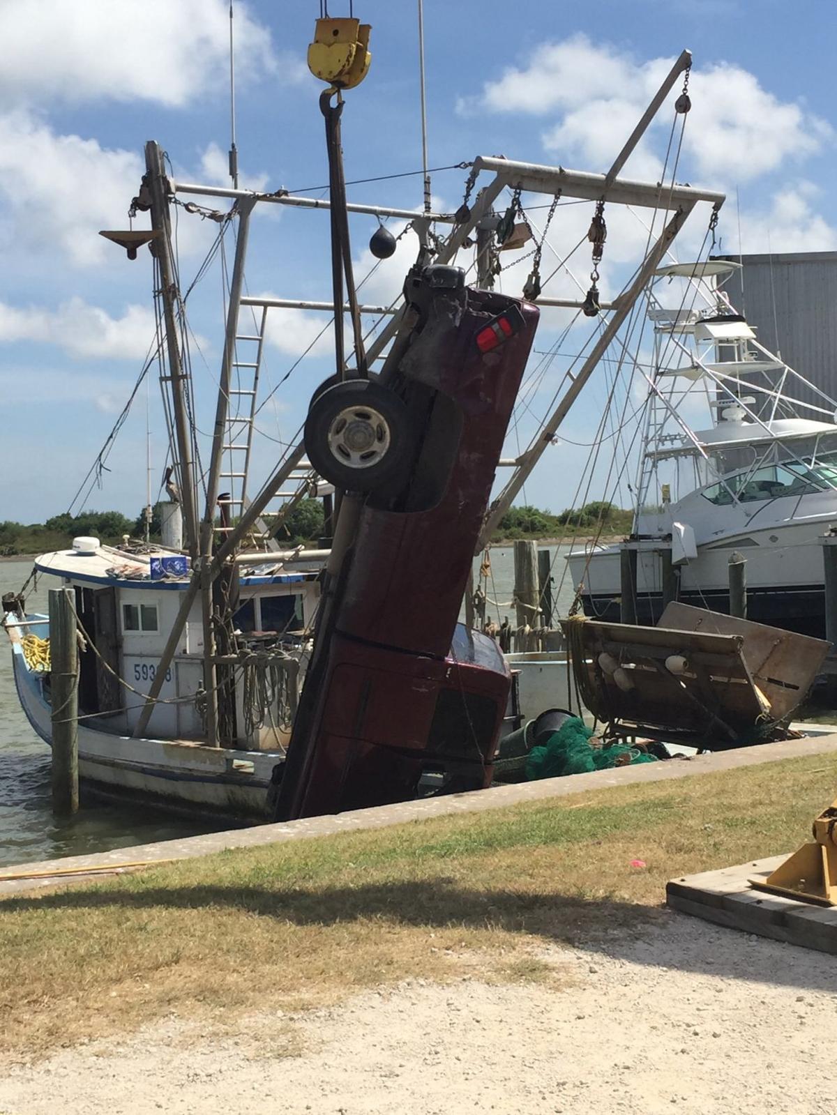 Truck overturns in Port O'Connor Fishing Center canal