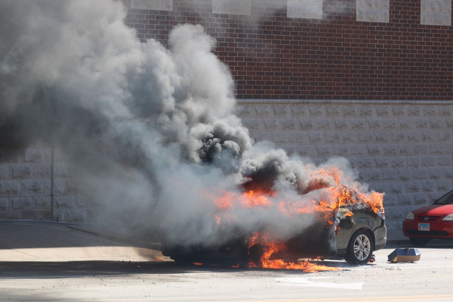 Car catches fire in the middle of the street on campus | News ...