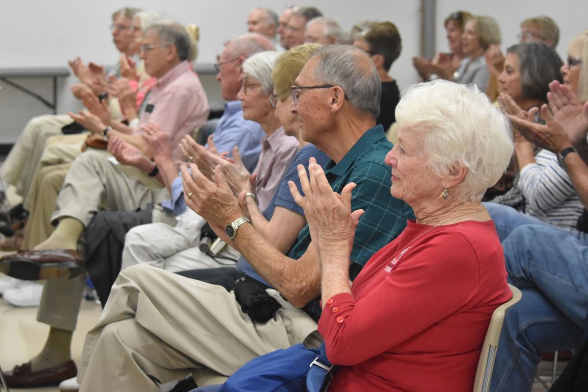 Crowd clapping at Normal Public Library