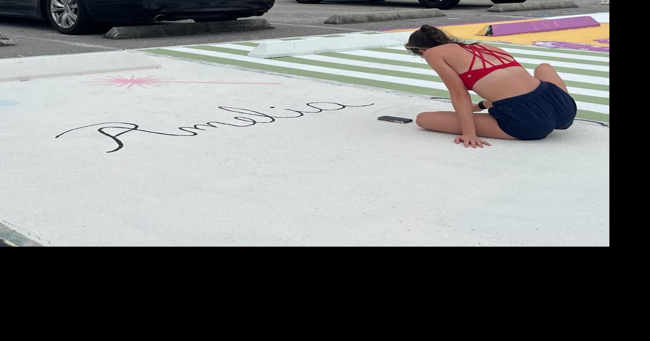 High school students' tradition creates colorful parking spots