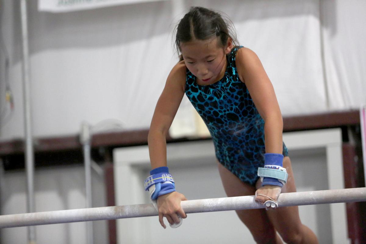 Despite missing fingers, Florida girl AAU gymnastics champion