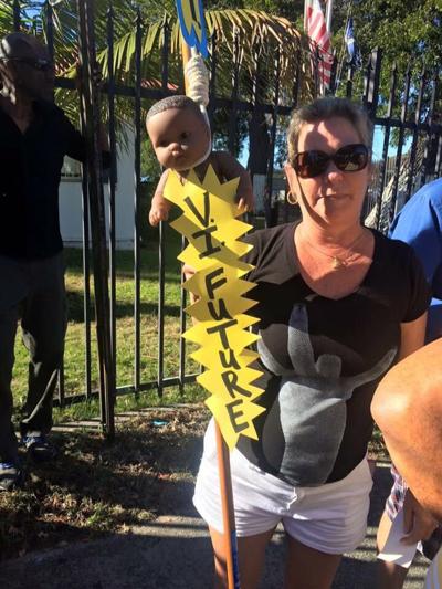 Protester S Use Of Black Doll In A Noose Generates Racial