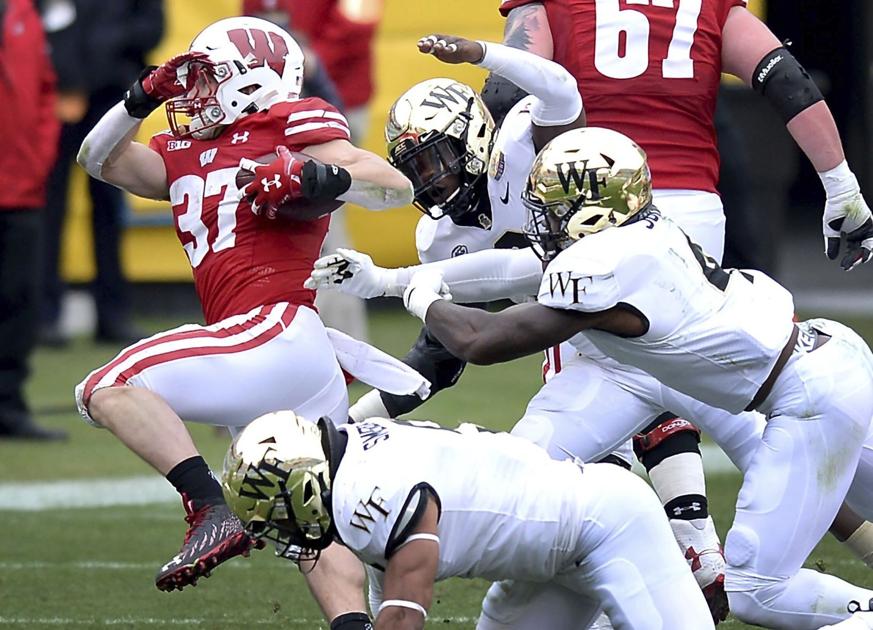 Ball drop: Wisconsin wins Duke's Mayo Bowl, breaks trophy ...