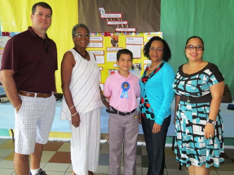 Gabriel Lewis — primary winner -parents — congresswoman-principal.jpg