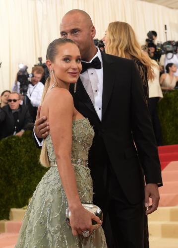 Hannah Davis and Derek Jeter attend the Manus x Machina: Fashion in an Age  of Technology Costume Institute Benefit Gala at Metropolitan Museum of Art  on May 2, 2016 in New York