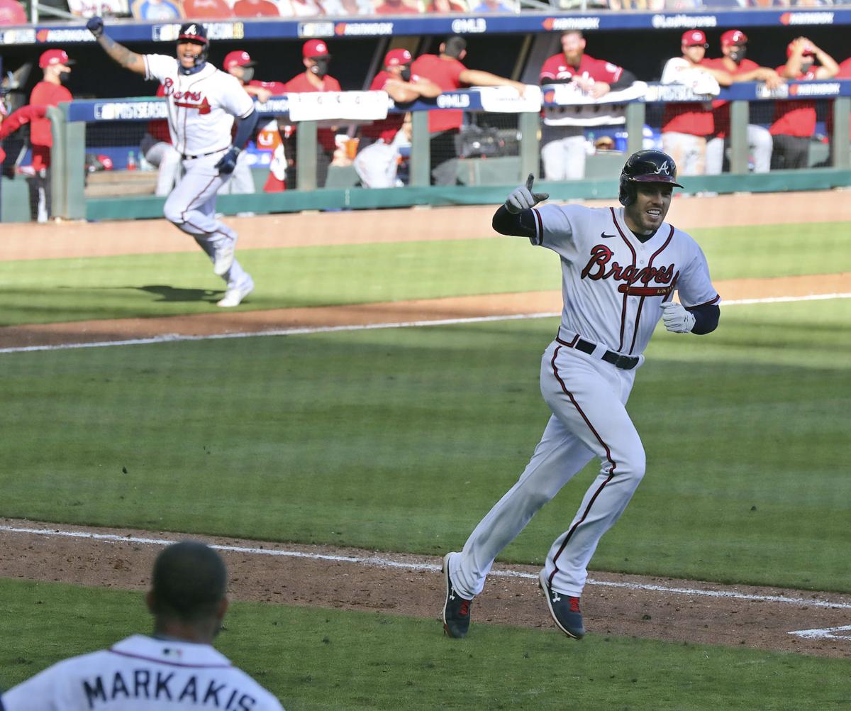 Freeman singles in 10th, Braves edge Reds 1-0