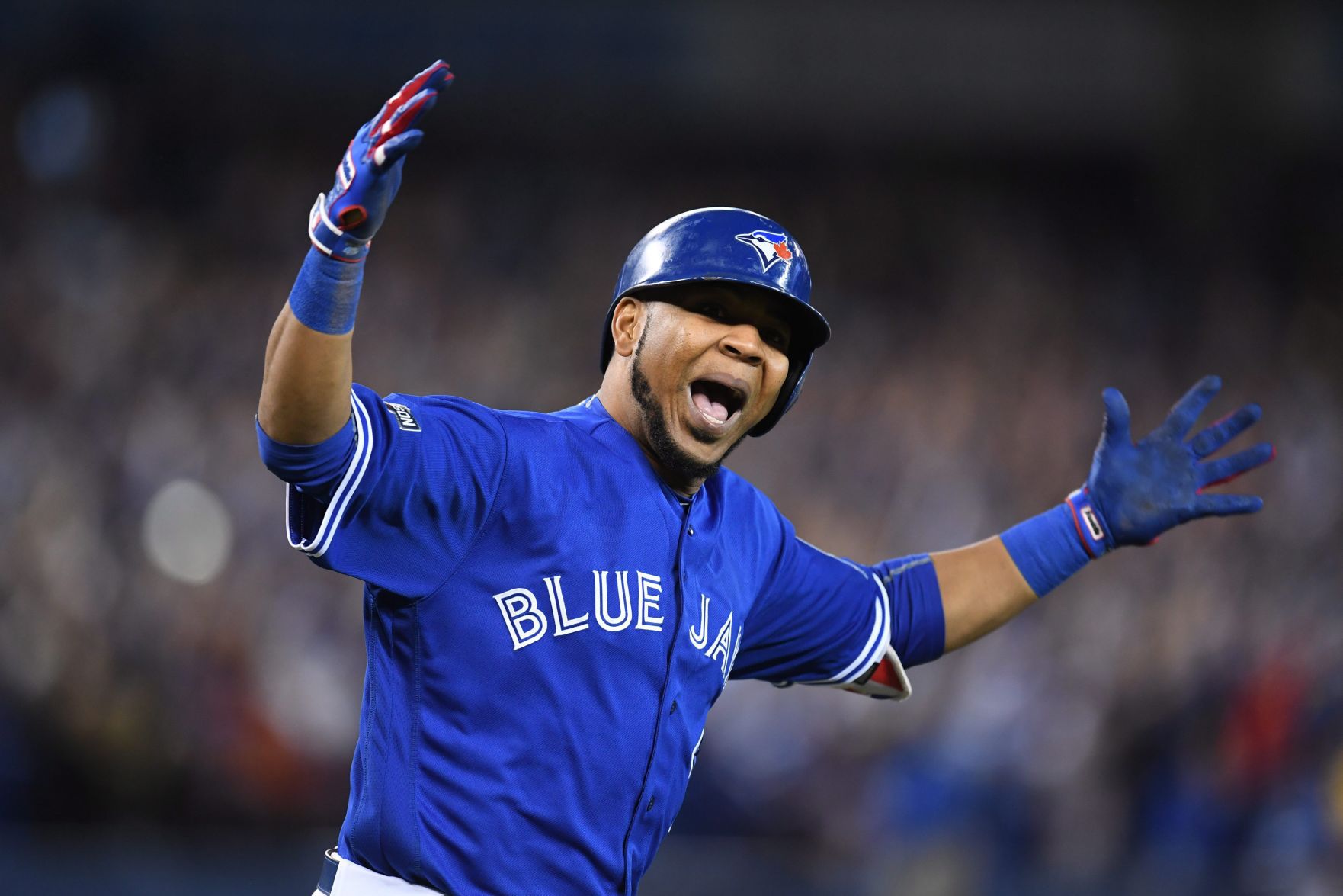 Encarnacion's 11th-inning HR lifts Jays over O's, into ALDS