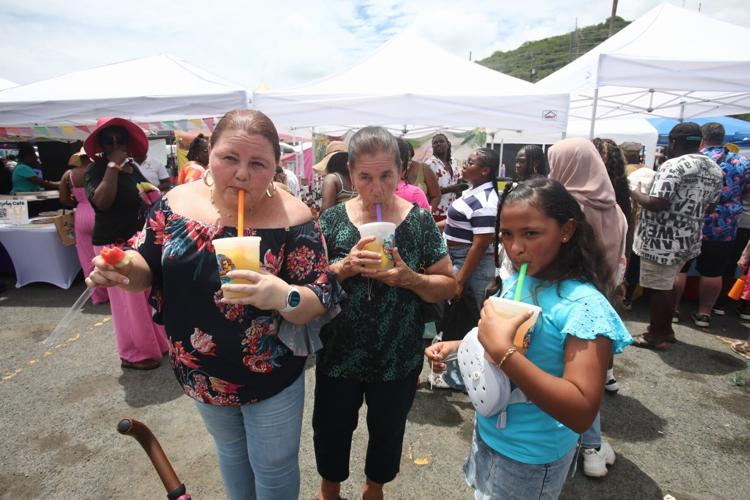 Food Fair honors Huggins as hundreds converge at Crown Bay for food and ...