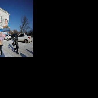 Drones, sirens, army posters: How four years of war changed a Russian city