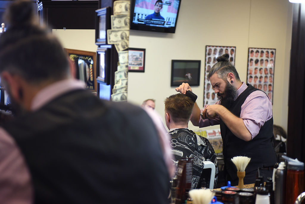 Elite Barber Shop Provides Haircuts With A Dash Of Class