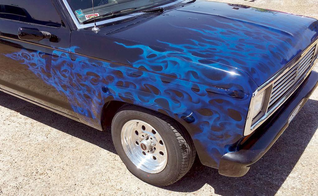 Your car is their canvas Auto body painters transform cars into art