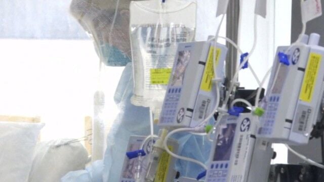 Visibly shaken Alabama health officer talks Covid surge, mobile morgues