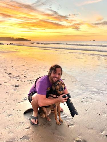 This man quit his corporate job to travel the world photographing dogs. He says he’s happier than ever