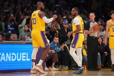 LeBron and Bronny James make history as first father-son to play together in NBA game