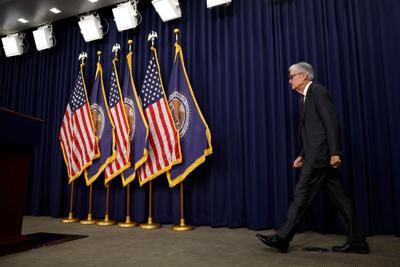 The Fed holds interest rates steady again as it warns of stagflation risk