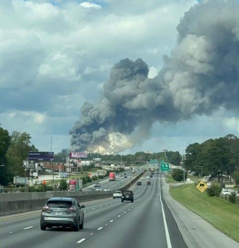 Thousands told to stay home a day after chemical plant fire sent a plume containing chlorine high into the air