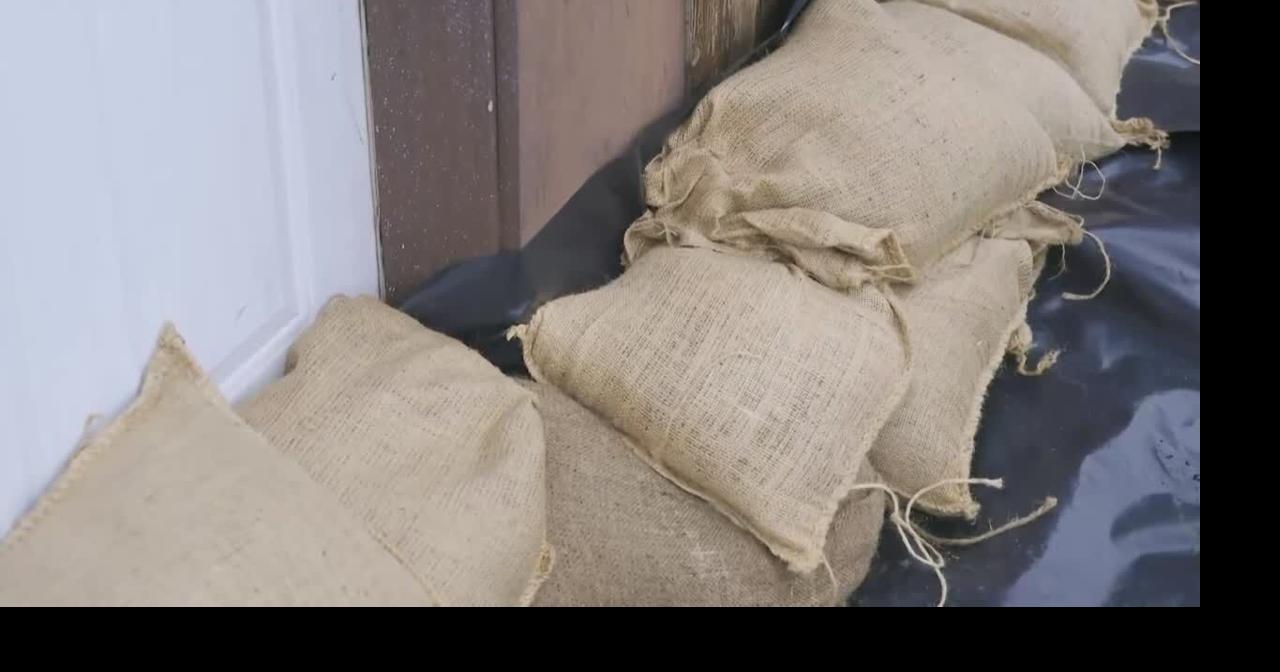 Residents sandbag businesses after threat from raging waters in Washington state