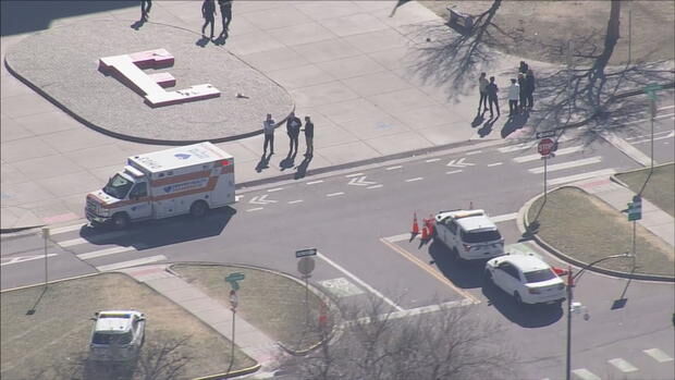 Male student shot 2 staff members at Denver high school before fleeing, officials say