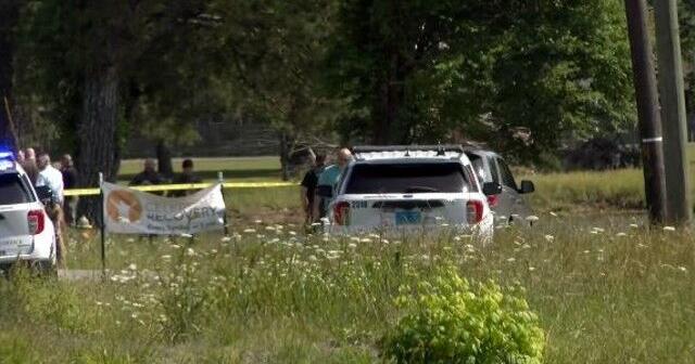 Car crashes into pond after officer-involved shooting in Owens Cross Roads