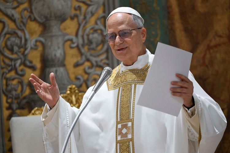 Pope Leo asks cardinals to make themselves ‘small’ in first mass as pontiff as cardinals deny he’s a ‘counterweight’ to Trump