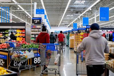 Walmart’s business surges as shoppers hunt for low prices