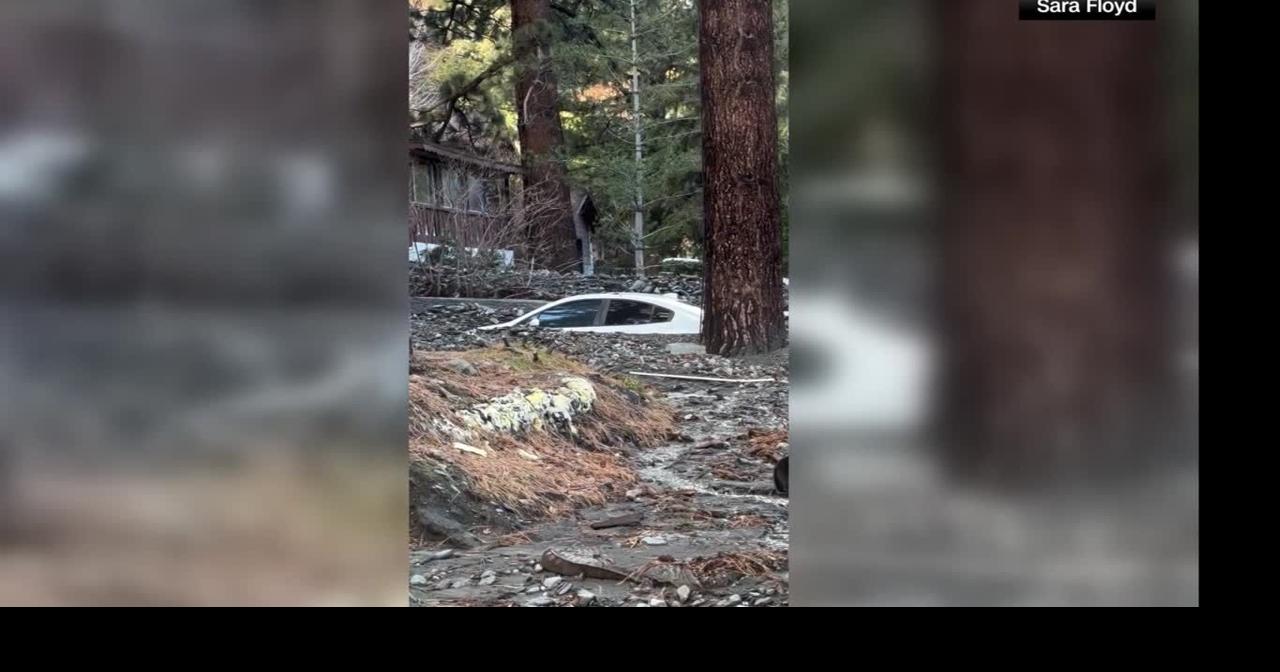 Receding floodwaters show buried cars in California