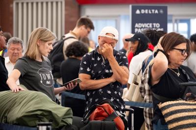 Hundreds of US flights are canceled for the 4th straight day. Here’s the latest on the global tech outage
