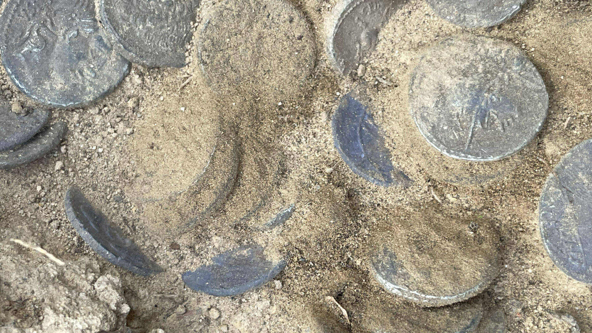 Buried treasure, including nearly 200 Roman coins, found in Italy 