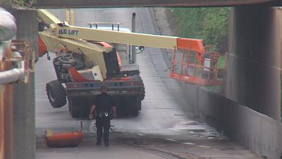 Trapped semi-truck removed from underpass