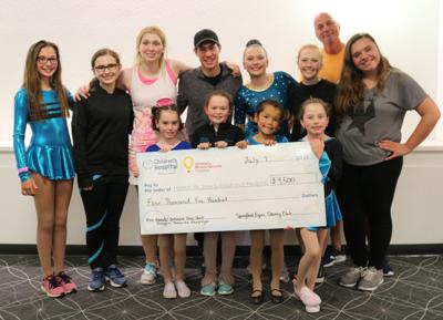 Club donates thousands to hospital NICU