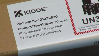 Volunteers install smoke alarms in homes in Champaign