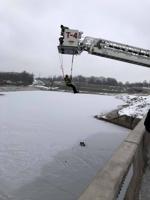 Decatur firemen rappel down to retrieve car seat from Lake Decatur