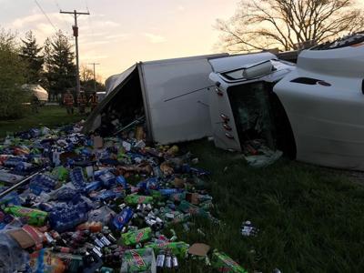 Semi hauling soda rolls over near Boody