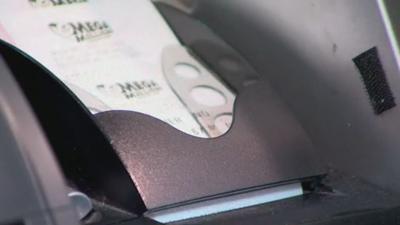 Champaign residents hoping to win big with Mega Millions