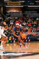 Heiden scores 16, Stuelke's return helps send No. 9 Iowa past Illinois 64-58 in Big Ten tourney