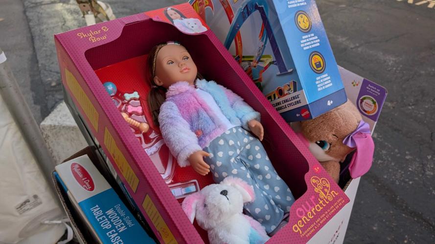 Doll and other toys donated to Spirit of Giving toy drive