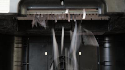 Shredded paper coming from shredder