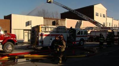 Firefighters battle flames, truck crash in east central Illinois