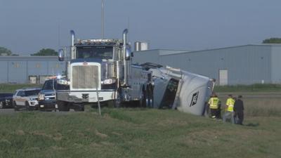 Semi truck rollover closes down interstate ramp