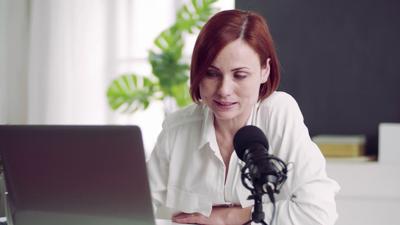 Person recording a podcast