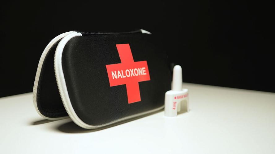 Naloxone and Narcan nasal spray in the emergency overdose kit bag used for recovery from narcotic opioid medications or street drugs overdose: Toronto, Ontario, Canada - March 23, 2024