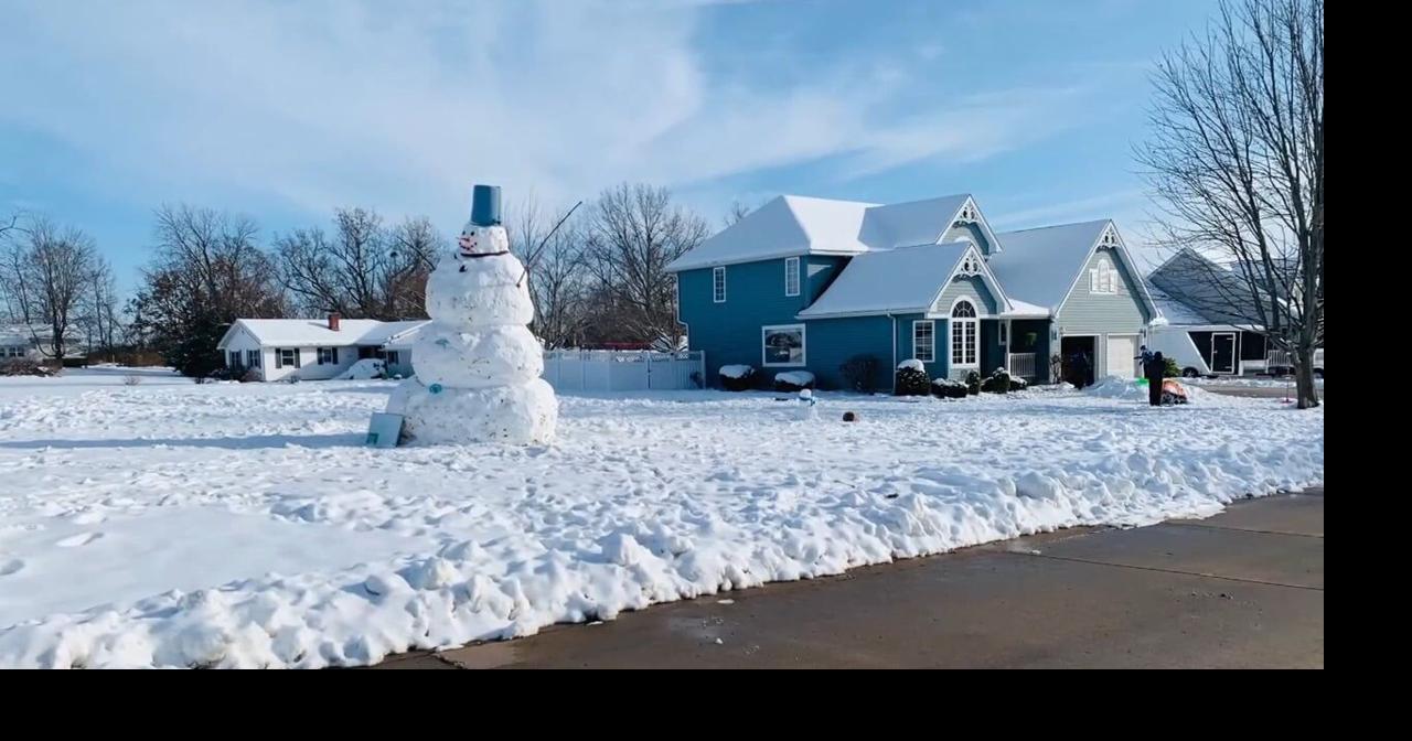 17foottall snowman named Bob stopping traffic Videos