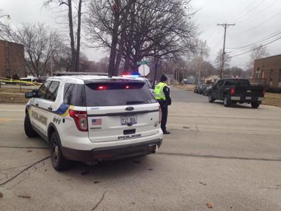 BREAKING: Officer injured in shooting, father says suspect dead