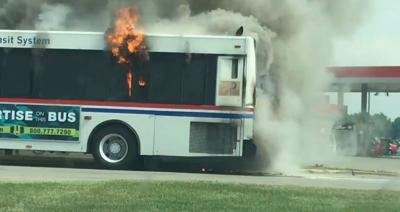 Transit bus bursts into flames with passengers on board