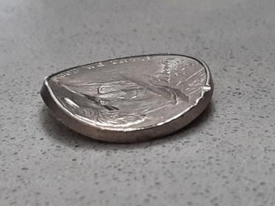 Bent nickel from hit & run