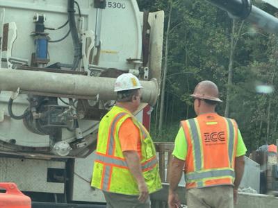 Construction workers on Reas Bridge in Decatur