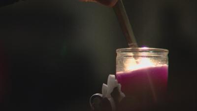 Candlelight service honoring, remembering domestic violence victims