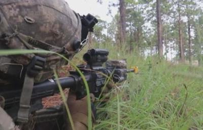 Illinois National Guard soldiers train in a simulated war